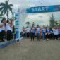Direktur Operasi dan Produksi, Jaka Kirwanto melepaskan peserta jalan sehat bersama BUMN pada Minggu, 19/02/2023 di komplek perumahan PT. PIM