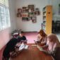 Foto : Penulis Membaca di Perpustakaan IAIDU Asahan Kisaran