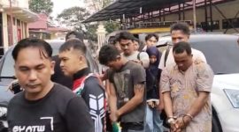 Foto:Pelaku Tersangka penembakan saat di Amankan polisi
