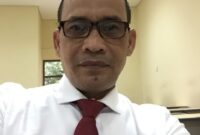 Dr. Firman Tobing