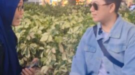 FOTO: Esti Rahaya, Jurnalis Media Suara Utama Internasional, saat melakukan wawancara dengan Arya Panda di Hong Kong. (Dok. Pribadi/SUARA UTAMA)