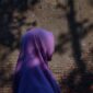 Moslem Woman Silhouette in Old Vintage Brick Wall Background